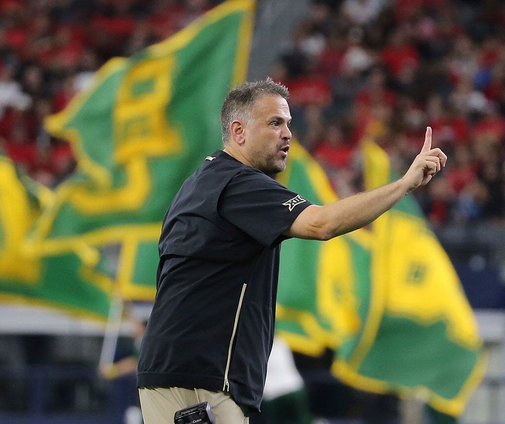Baylor head coach Matt Rhule call a play to his team in the second half of an NCAA college...