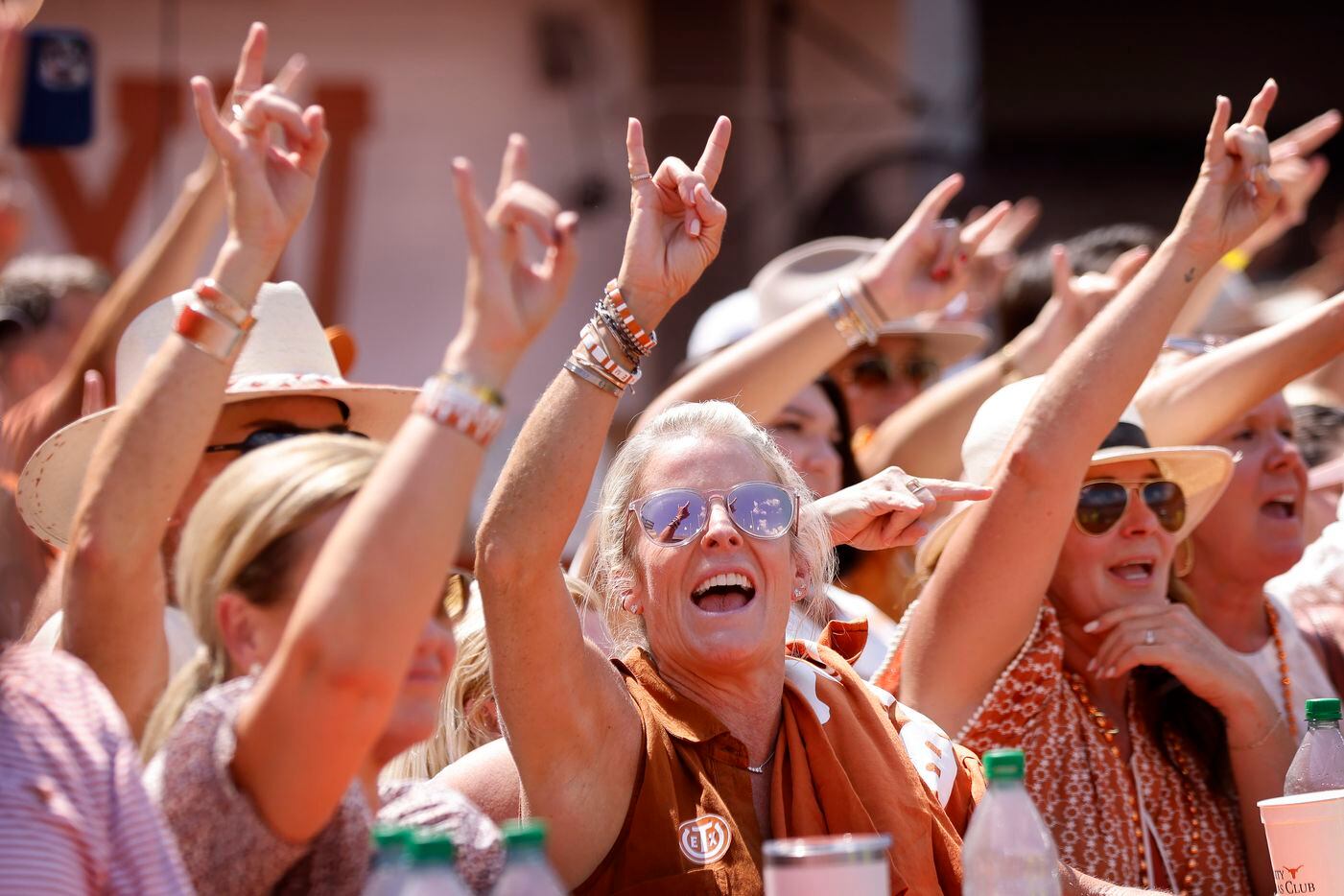 Texas Longhorns fans sing the school song following their loss to the Alabama Crimson Tide...