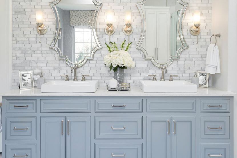 You can't go wrong with sconces above a vanity, says Emily Sheehan Hewett.