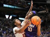 LSU forward Angel Reese (10) drives to the basket against Virginia Tech forward Taylor Soule...