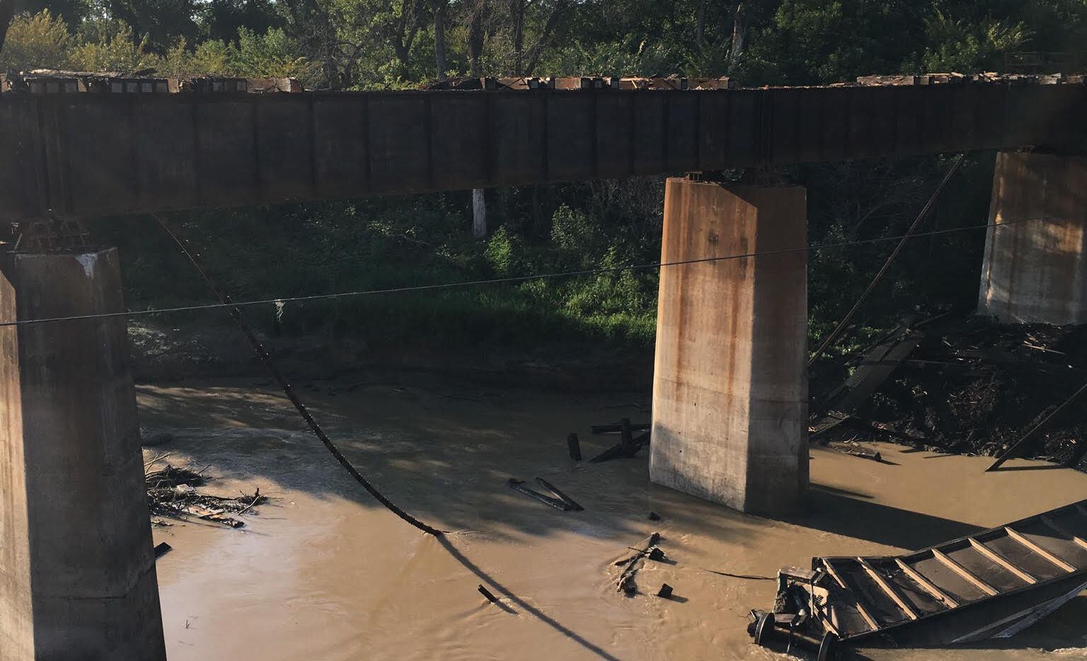 Five Union Pacific train cars fell into Denton Creek on Aug. 21 after a derailment. 
