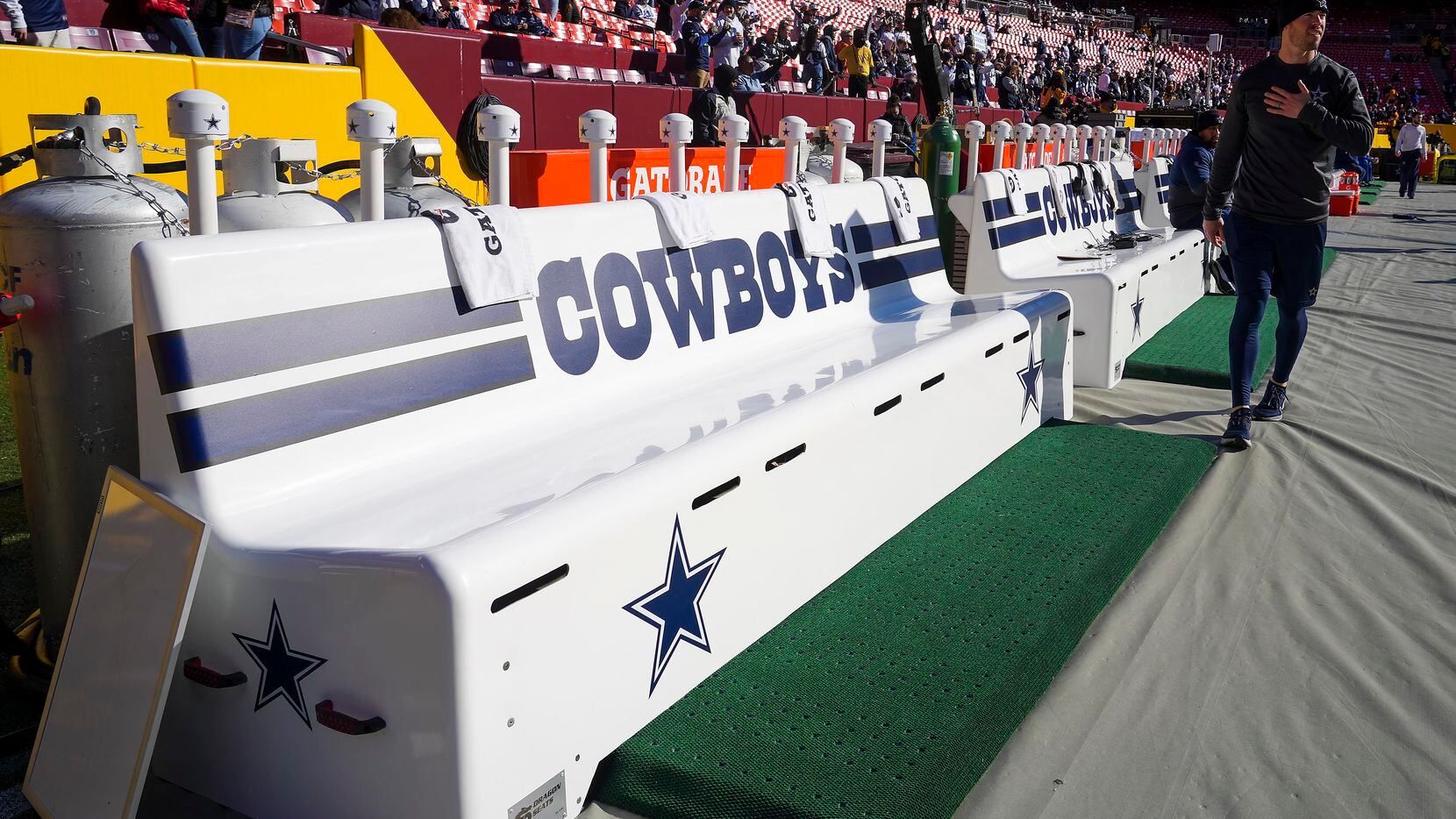Towels are set out on the Dallas Cowboys bench before an NFL football game against the...