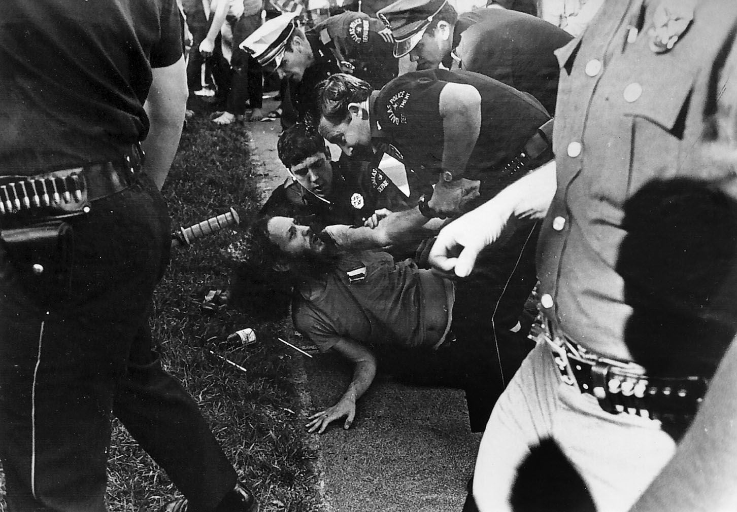 Brent Stein, a.k.a. "Stoney Burns," is arrested April 12, 1970 by Dallas Police officers at...
