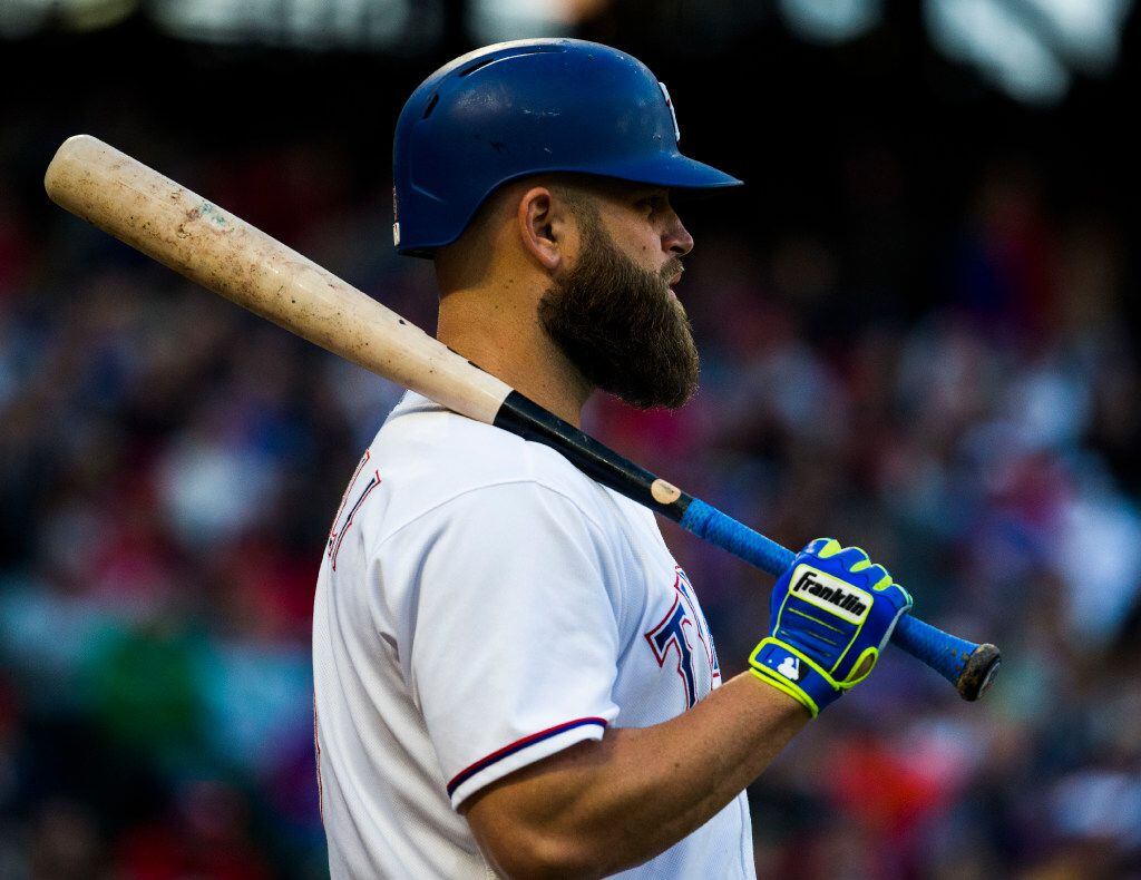 Texas Rangers first baseman Mike Napoli (5) waits his turn to bat during the first inning of...