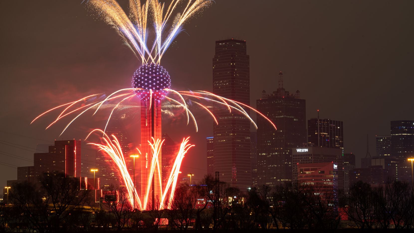 Get within viewing distance of Reunion Tower Over the Top NYE and you’ll see fireworks, LEDs...