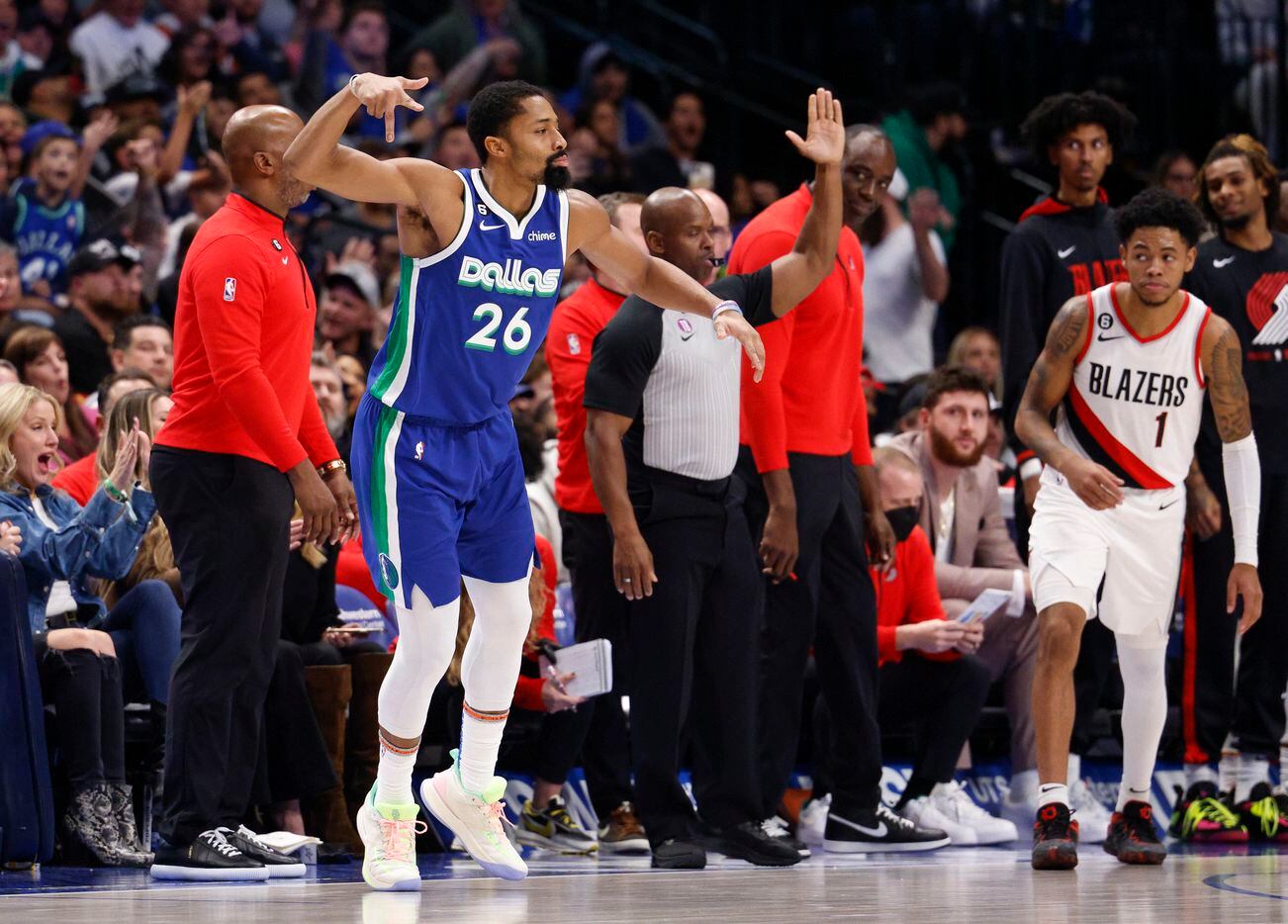 Dallas Mavericks guard Spencer Dinwiddie (26) celebrates after a three-point shot during the...