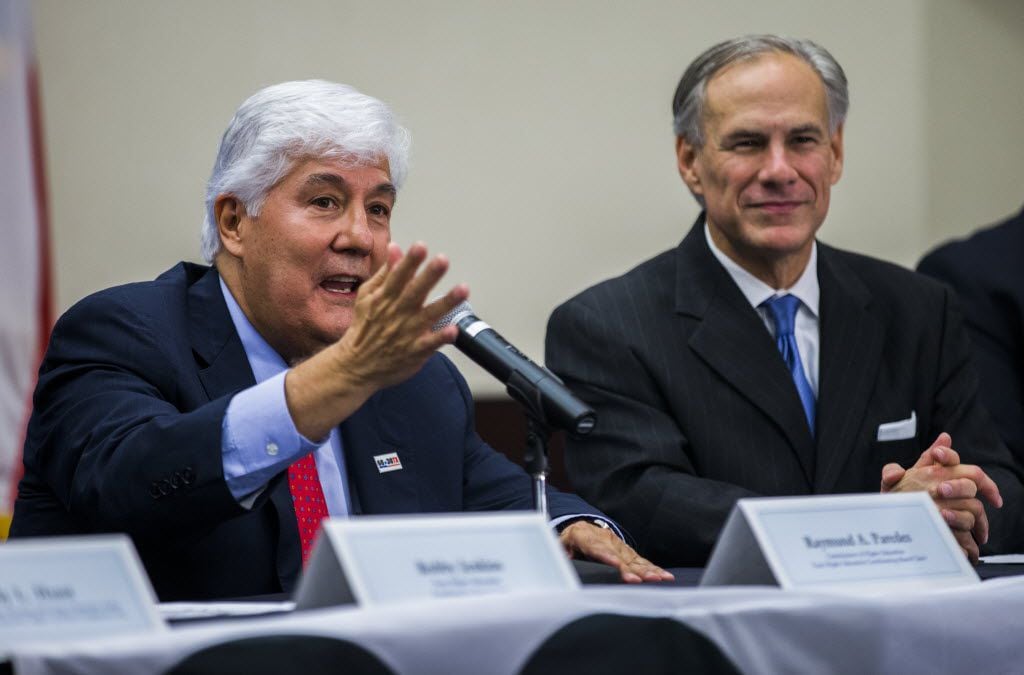 Raymund A. Paredes (left), commissioner of Higher Education and Texas Higher Education...