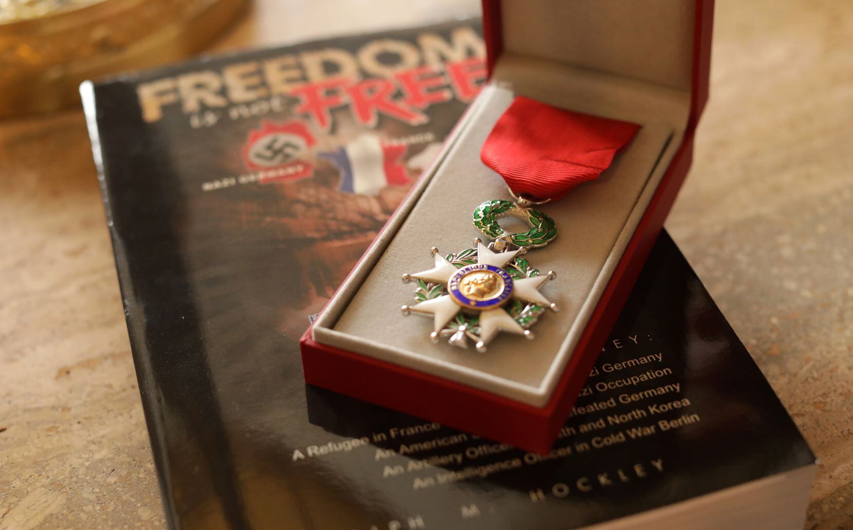 Ralph Hockley’s Legion of Honor medal, France’s highest civilian award, sits atop "Freedom...