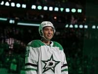 Dallas Stars left wing Jason Robertson (21) skates on the ice as he is announced as a star...