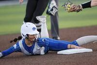 Plano West baserunner Izzy Dunn (3) steals second base avoiding the tag during the bottom of...