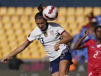 United States' Alex Morgan goes for a header during a CONCACAF Women'Championship soccer...