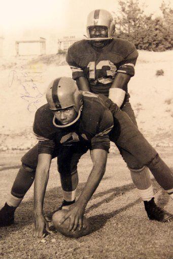 ORG XMIT: S11ADA27B Johnny Kennard poses with quarterback Kelton Winston (13) in this 1957...