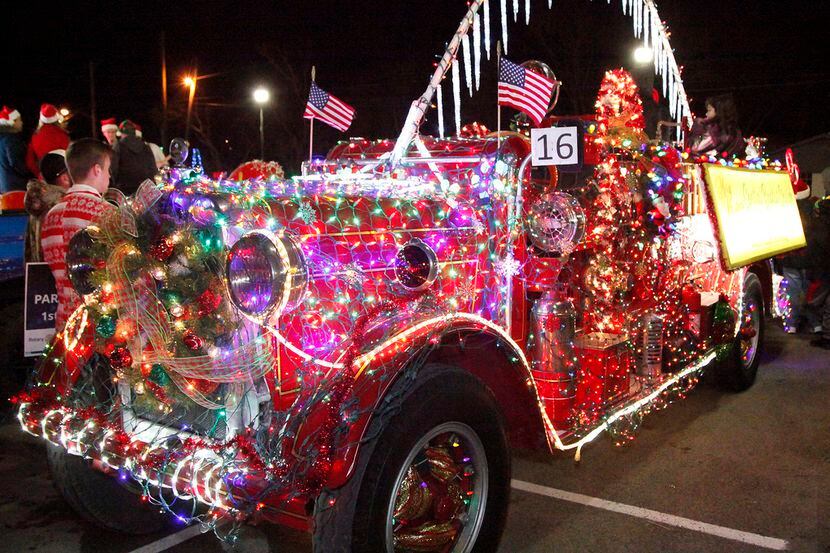 A decorated fire engine at the McKinney Christmas Parade of Lights in downtown McKinney