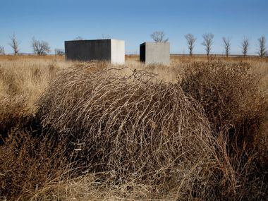 Tumbleweeds near some of the Donald Judd, 15 untitled works in concrete, 1980-1984 at the...