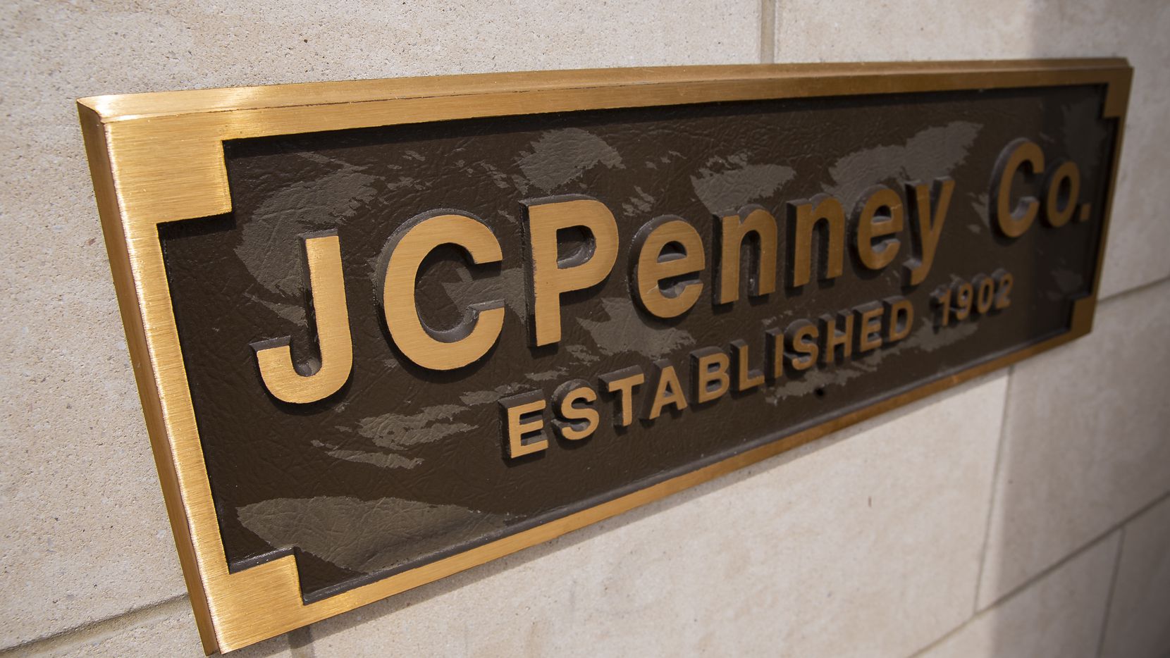 A plaque on the exterior of the J.C. Penney located in the Timber Creek Crossing shopping...