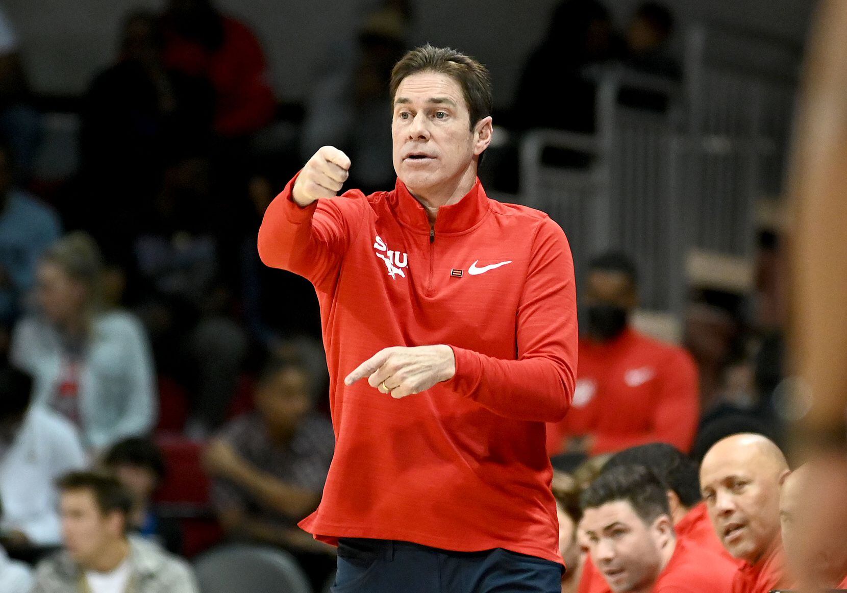 SMU head coach Tim Jankovich directs his team in the first half during a men’s NCAA...