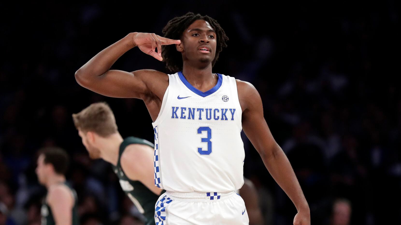 Kentucky guard Tyrese Maxey (3) reacts after making a 3-point basket during the first half of the team's NCAA college basketball game against Michigan State on Tuesday, Nov. 5, 2019, in New York.