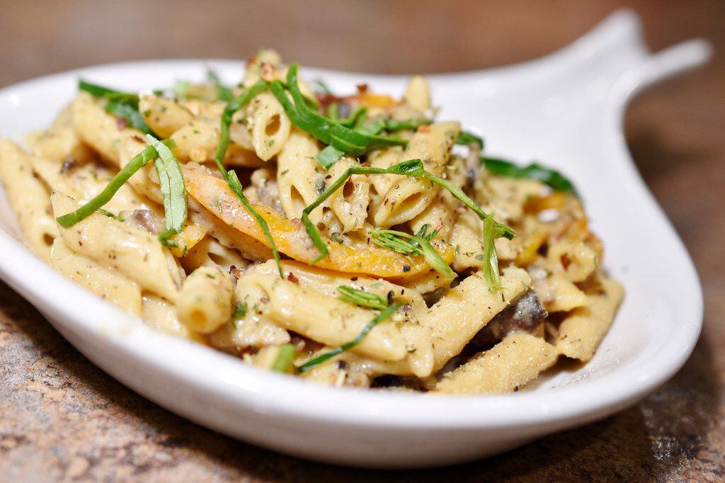 James McGee, owner of Peace Love & Eatz, a vegan restaurant in DeSoto, cooked a vegan pasta...