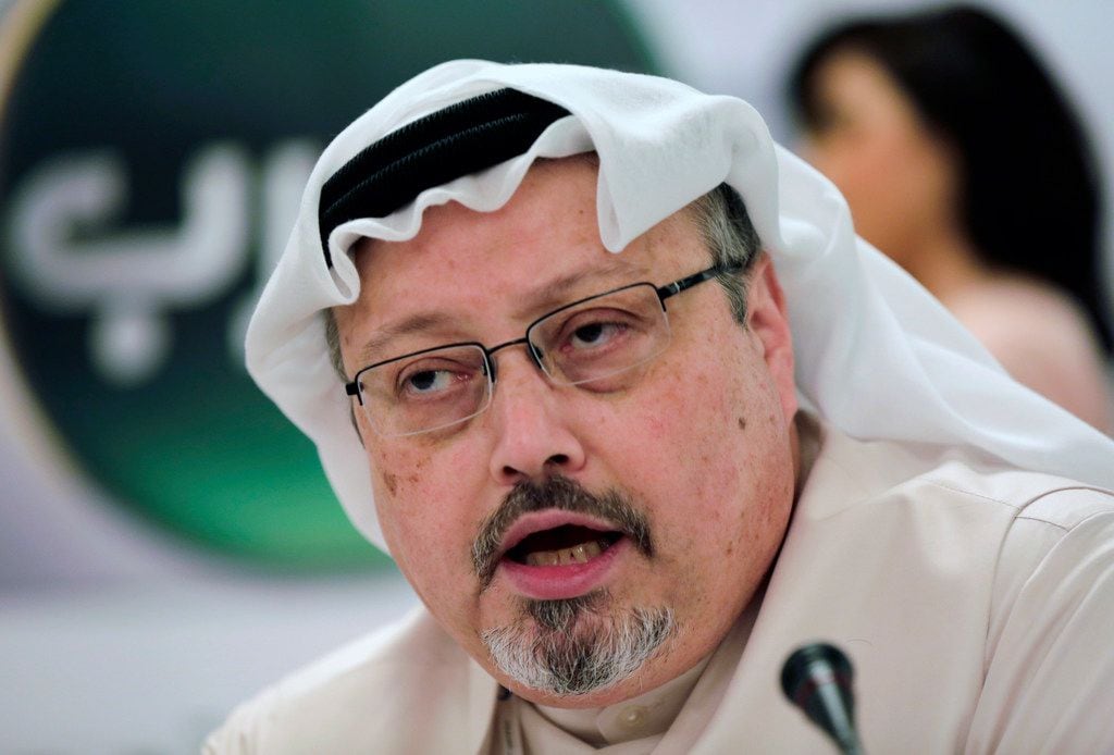 The late Saudi journalist Jamal Khashoggi speaks during a press conference in Manama,...