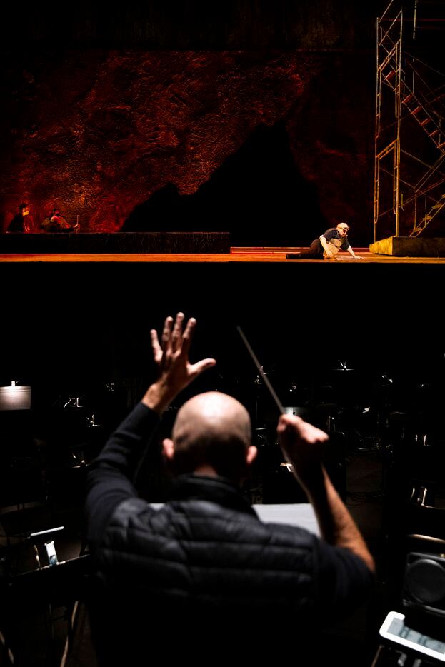 Tenor Barry Banks performs as music director Emmanuel Villaume conducts during staging...