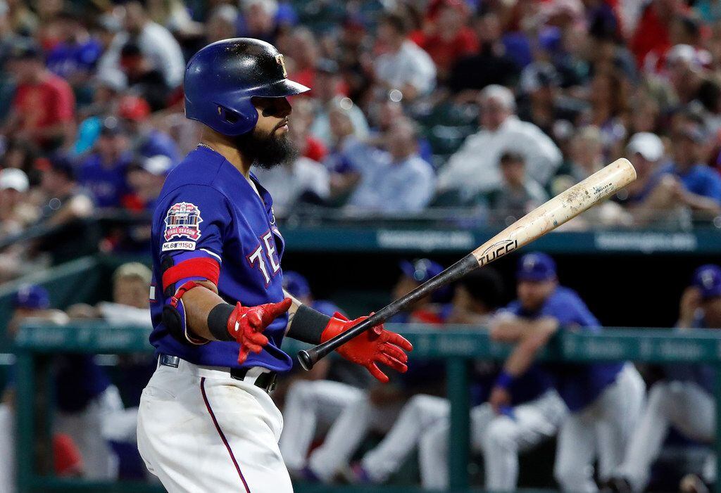Texas Rangers' Rougned Odor flips his bat after striking out against Kansas City Royals relief pitcher Wily Peralta during the seventh inning of a baseball game in Arlington, Texas, Thursday, May 30, 2019. (AP Photo/Tony Gutierrez)