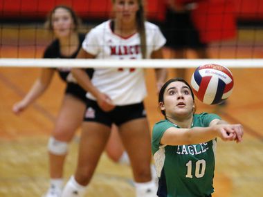 Northwest Eaton’s Lorena Gomez keeps a point alive during Tuesday's 25-22, 24-26, 25-18, 25-12 win over Flower Mound Marcus. (Stewart F. House/Special Contributor)