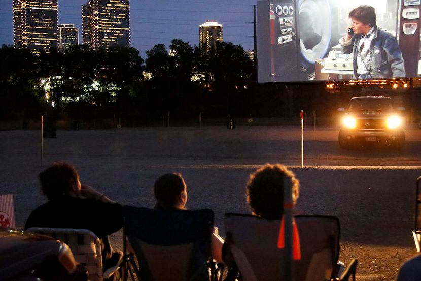 People watch "Back To The Future" at the Coyote Drive-In in Fort Worth.