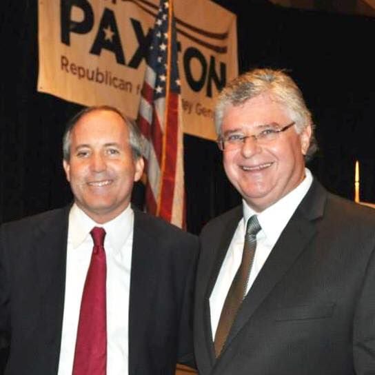 Andrew D. Leonie, right, is pictured with Attorney General Ken Paxton in a photograph posted to Leonie's Facebook in November.