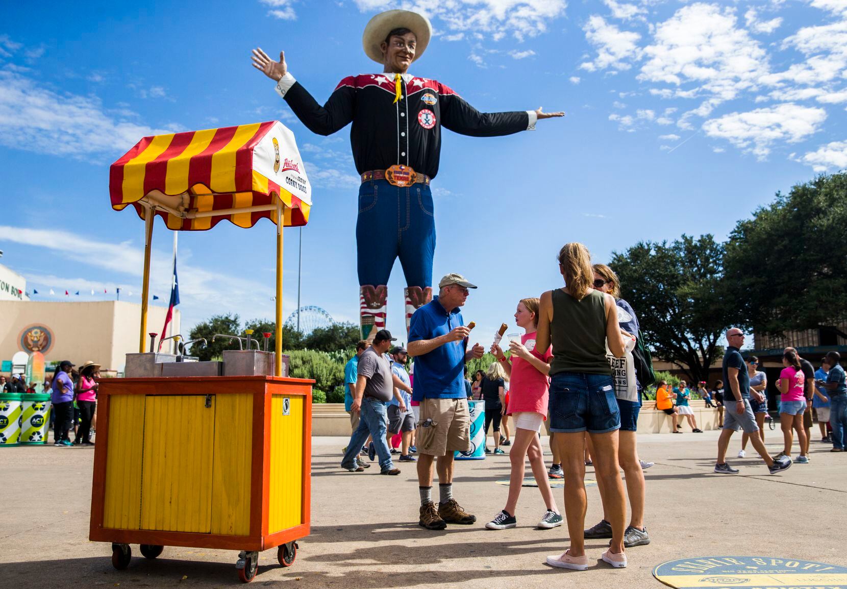 Big Tex, who is 55 feet tall, stands in the middle of 12 million square feet of fairgrounds...