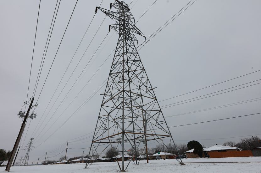 A power transmission tower in Fort Worth after a snow storm on Feb. 17, 2021.