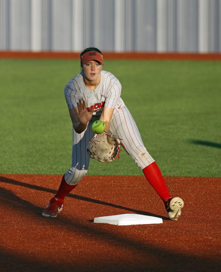 Flower Mound Marcus' Haidyn Sokoloski (3) catches the ball at second base during the game...
