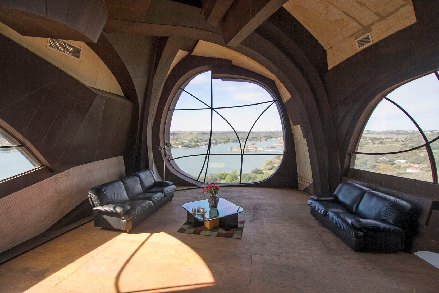 Lake Ransom Canyon is seen through the interior window of Robert Bruno's Steel House.