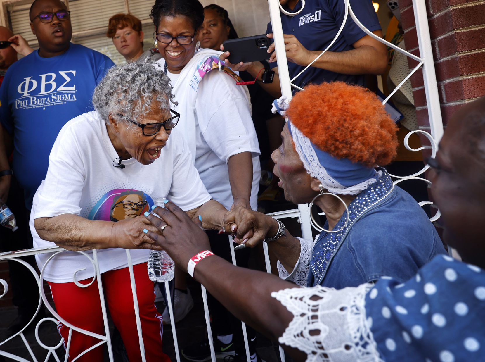 Longtime friend Lucille Williams (right) surprised Opal Lee, 94, during a Juneteenth breakfast event at Evans Avenue Plaza on Saturday before Lee left on her walk to downtown Fort Worth. For the first time since her dream of Juneteenth being made a national holiday became reality, Lee led a 2½-mile march from the historic South Side to the Tarrant County Courthouse. 