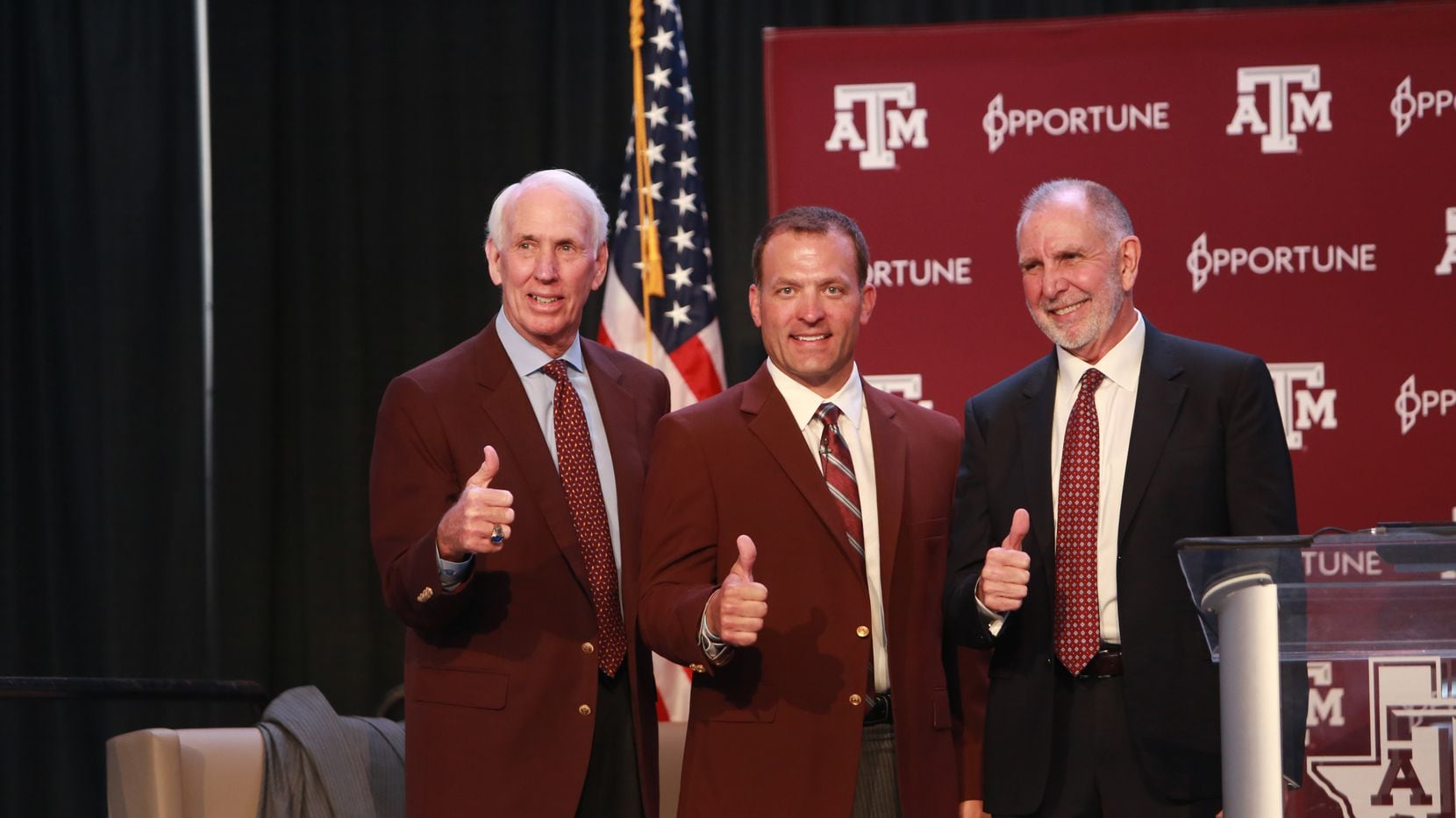 Texas A&M's interim Athletic Director R.C. Slocum poses alongside new Athletic Director Ross...