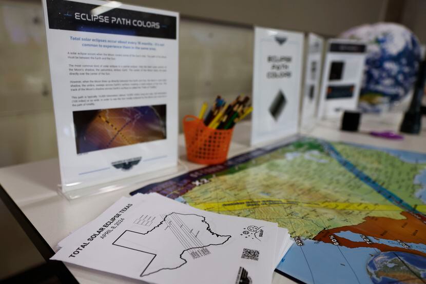 Stationaries for demonstration purposes sit on a table during an eclipse-focused training...