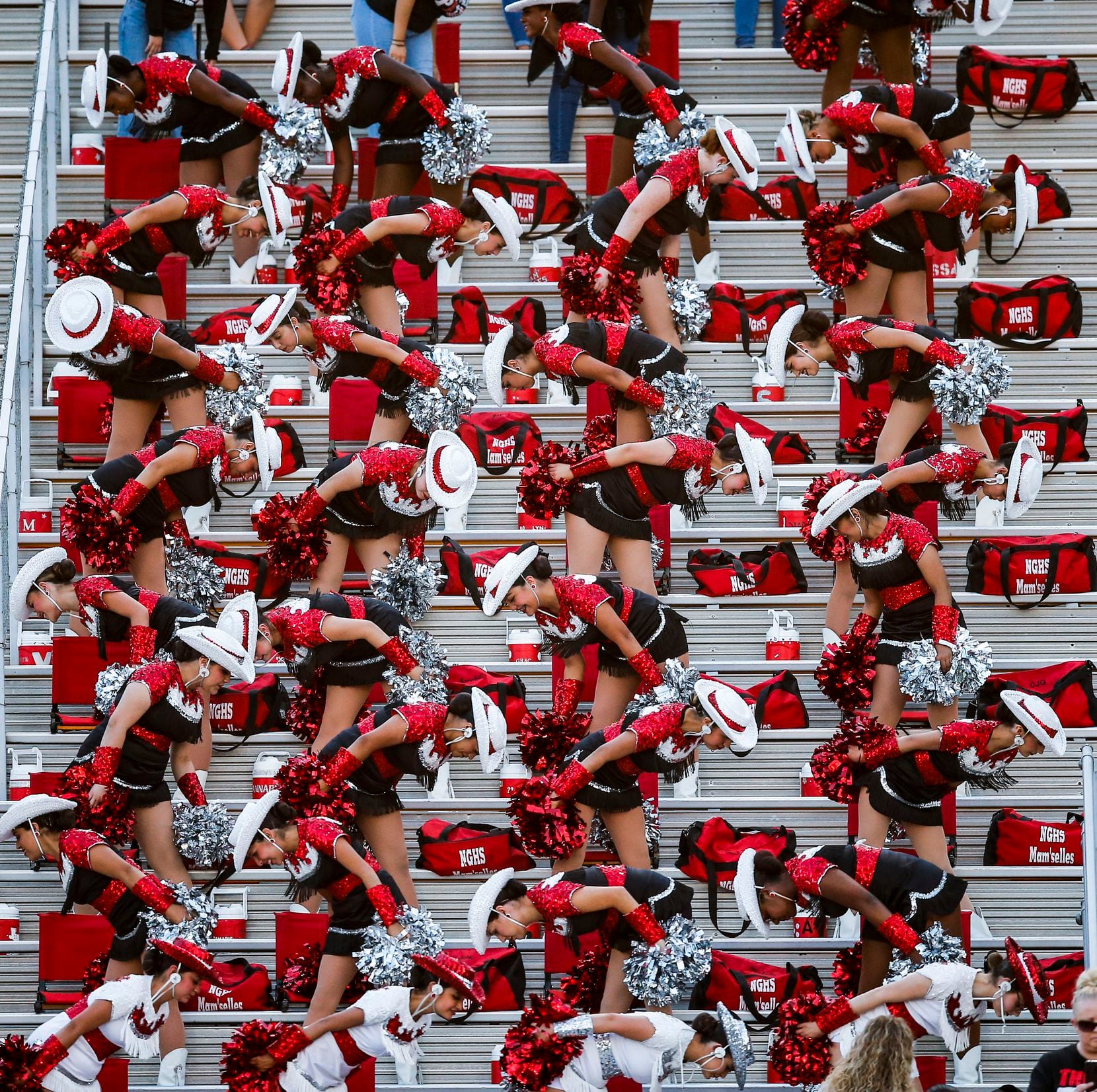 North Garland High School’s Mam’selles drill team performed in the stands during a game at...