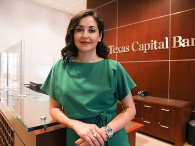 Anna Alvarado stands outside Texas Capital Bank offices. She was recently named chief legal officer of Dallas-based Texas Capital Bancshares.