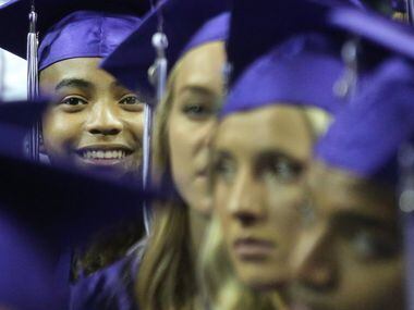 14-year-old Carson Huey-You is pictured in the crowd of graduates as he prepares to receive...