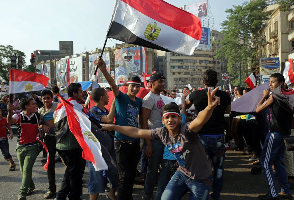 Supporters of Egyptian President Abdel-Fattah el-Sissi celebrated his inauguration in Tahrir...
