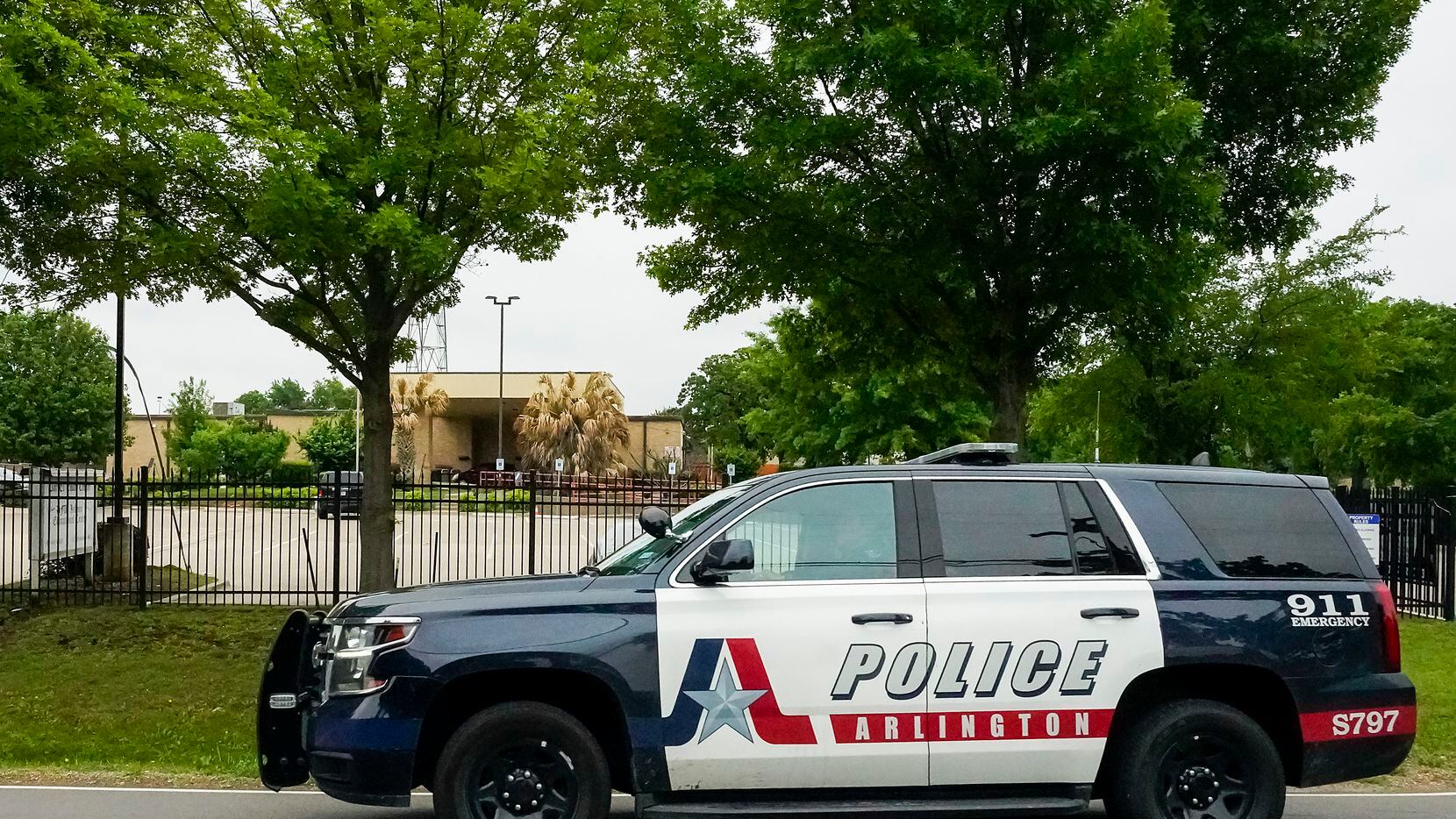 An Arlington police vehicle passes the Dar El-Eman Islamic Center on Mansfield Road...