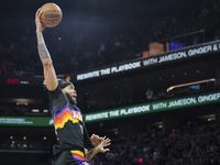 Phoenix Suns center JaVale McGee (00) goes up for a dunk after stealing the ball from Dallas...