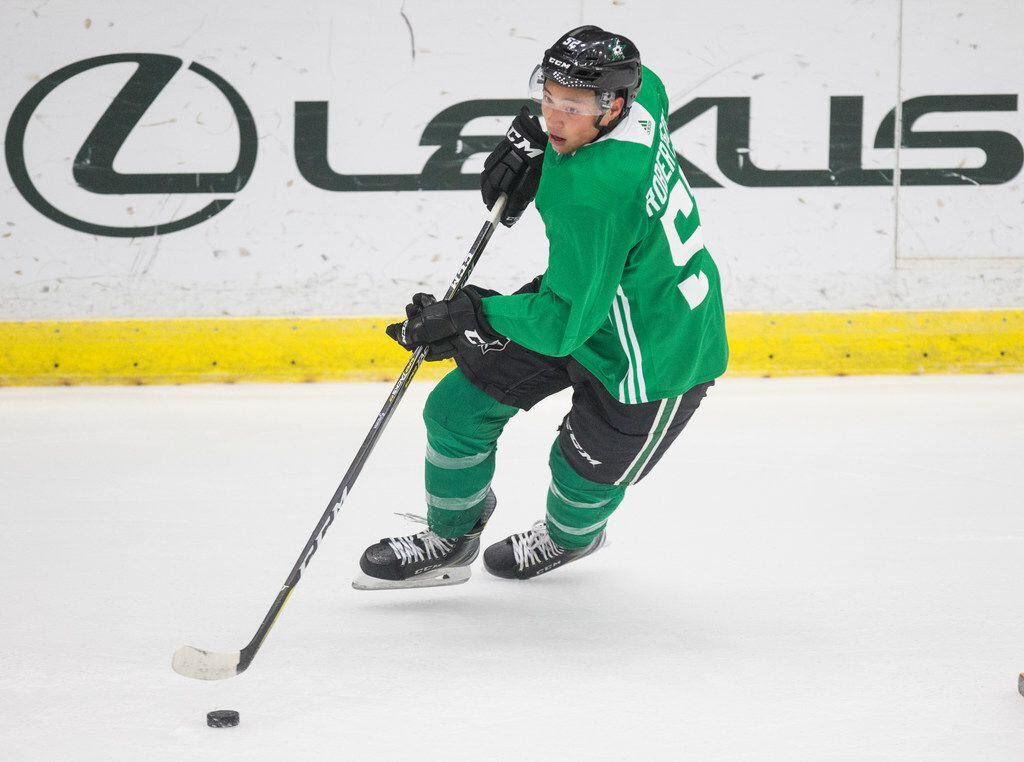 Jason Robertson (52) participates in a drill during Dallas Stars prospect camp on Tuesday,...