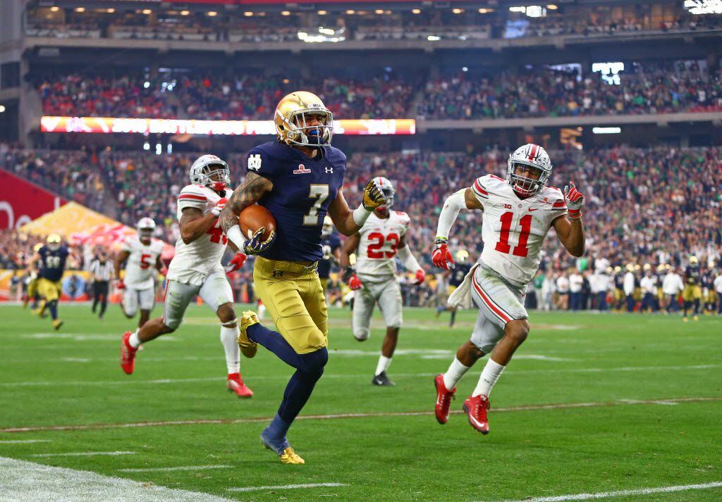 Jan 1, 2016; Glendale, AZ, USA; Notre Dame Fighting Irish wide receiver Will Fuller (7) runs for a touchdown against the Ohio State Buckeyes during the 2016 Fiesta Bowl at University of Phoenix Stadium. The Buckeyes defeated the Fighting Irish 44-28. Mandatory Credit: Mark J. Rebilas-USA TODAY Sports