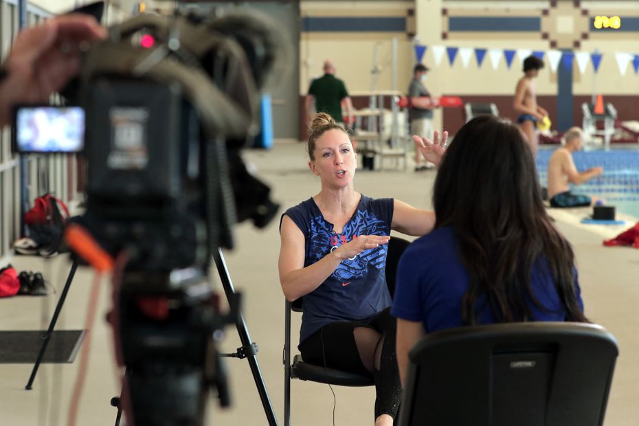 Laura Wilkinson discusses her journey in a TV interview while training at the Conroe...