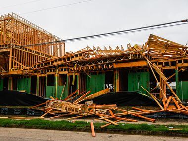 A townhouse construction partially collapsed at Munger Ave and Annex Ave after a severe...