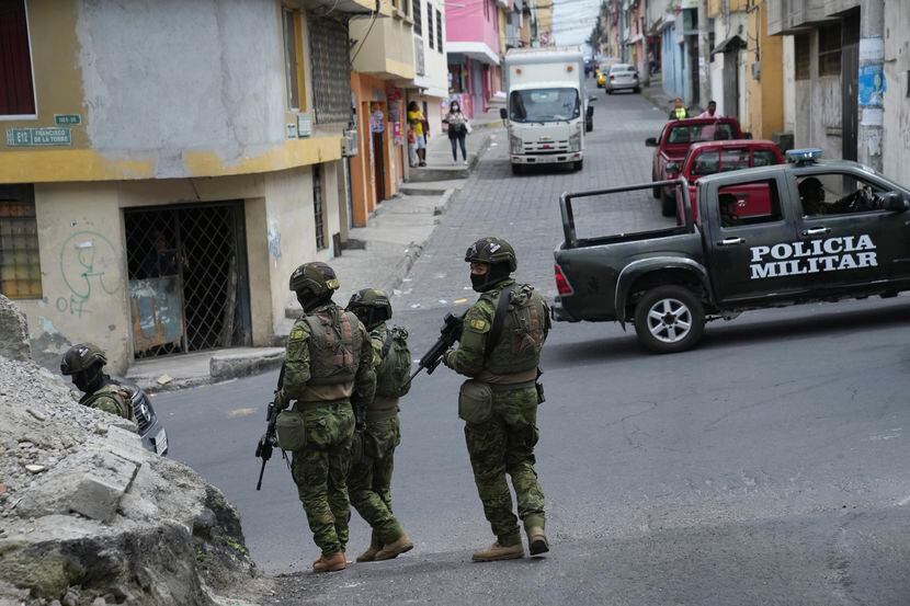 Soldiers patrol in a residential area of northern Quito, Ecuador, Thursday, Jan. 11, 2024....