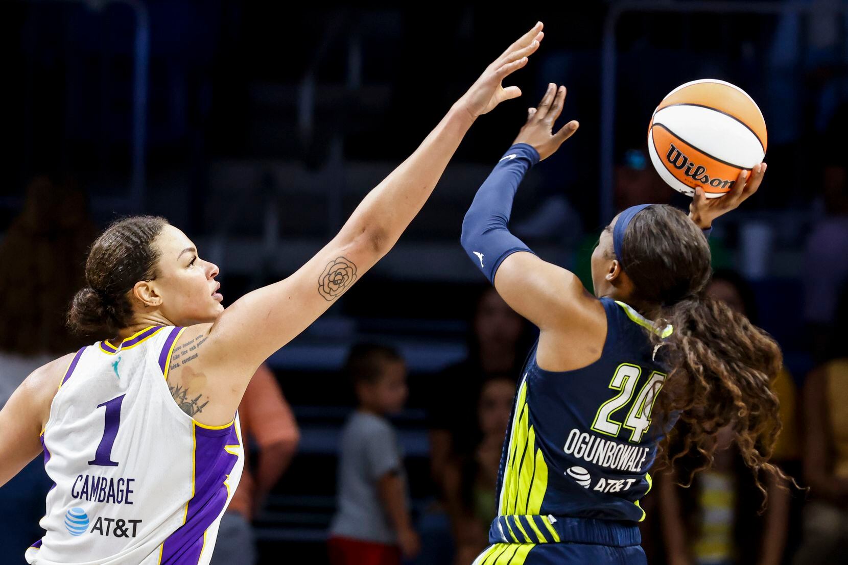 Los Angeles Sparks center Liz Cambage (1) defends against Dallas Wings guard Arike...