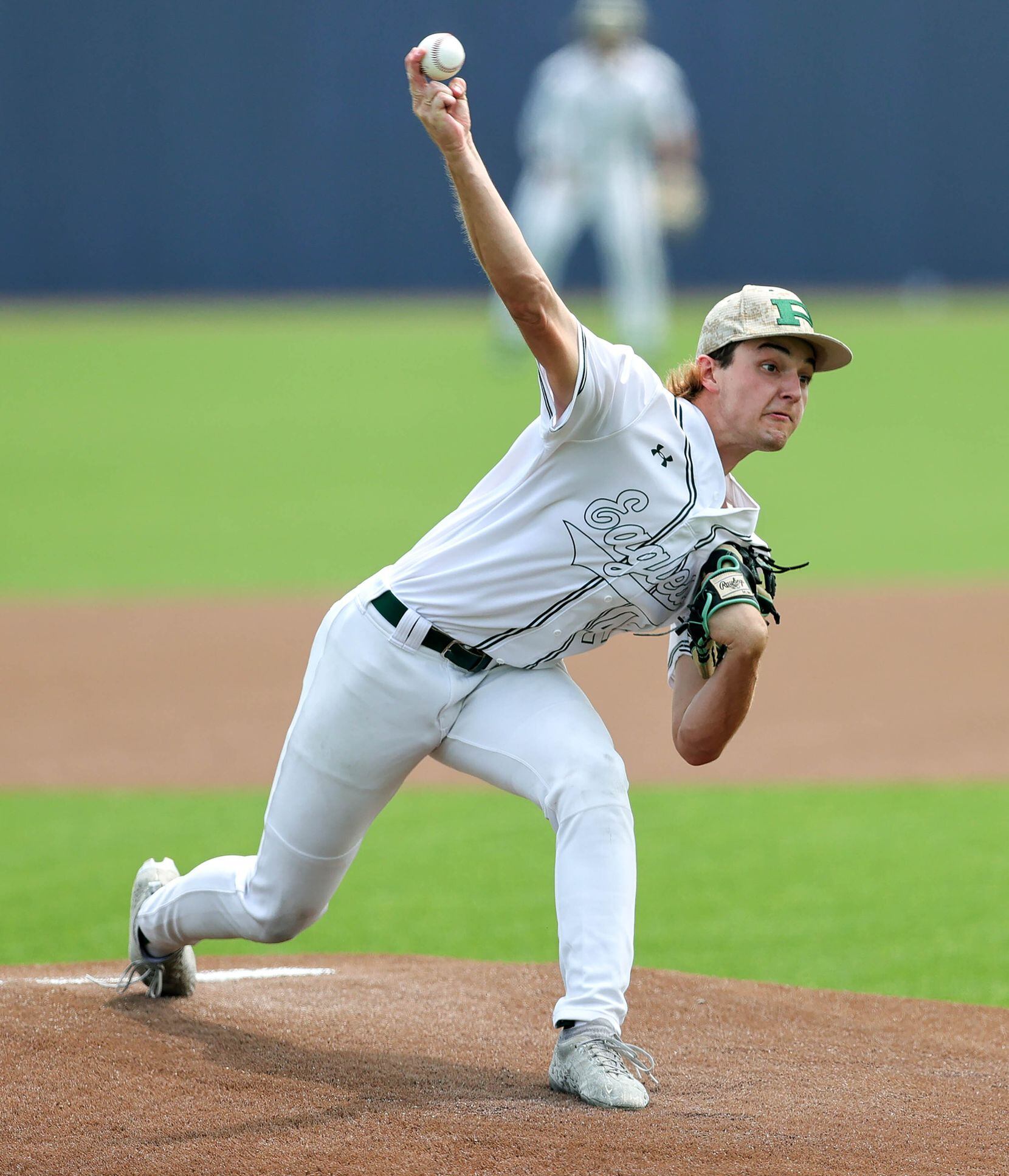 Prosper starting pitcher Luke Billings delivers a pitch to Coppell during game 3 of the 6A...