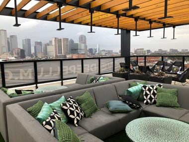 The rooftop lounge of the Novel Deep Ellum apartments offers views of downtown.