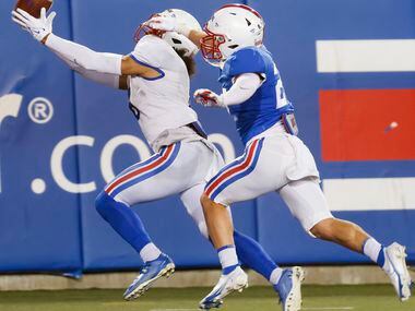 Southern Methodist Mustangs wide receiver Austin Upshaw (6) scores on a play called by...